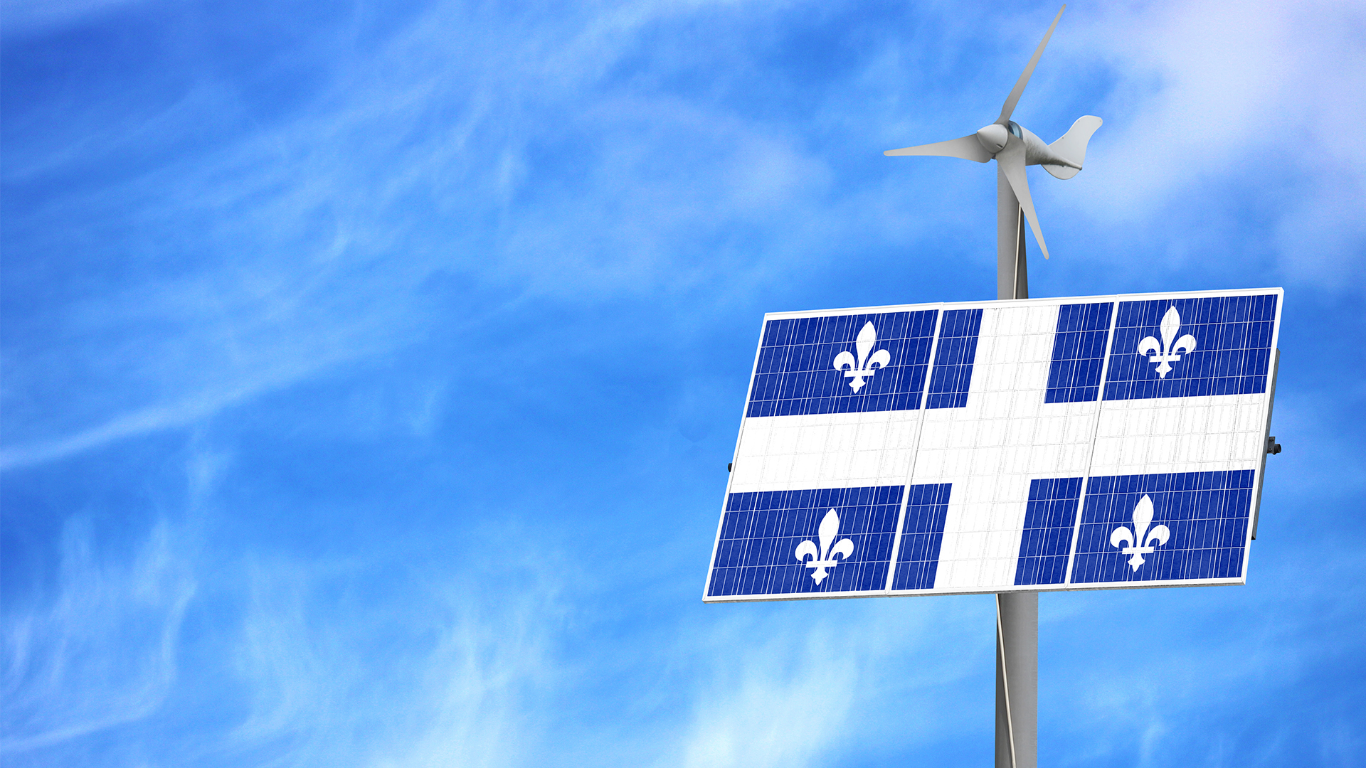 Un panneau solaire aux couleurs du drapeau du Québec est surplombé d’une petite éolienne.