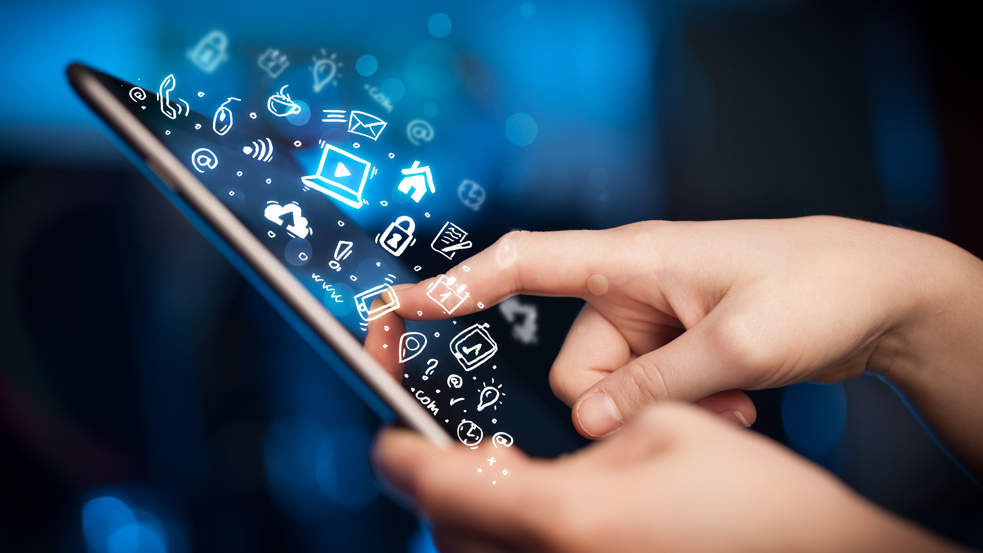 a hand slides over a smartphone, from which emerge icons and emojis.